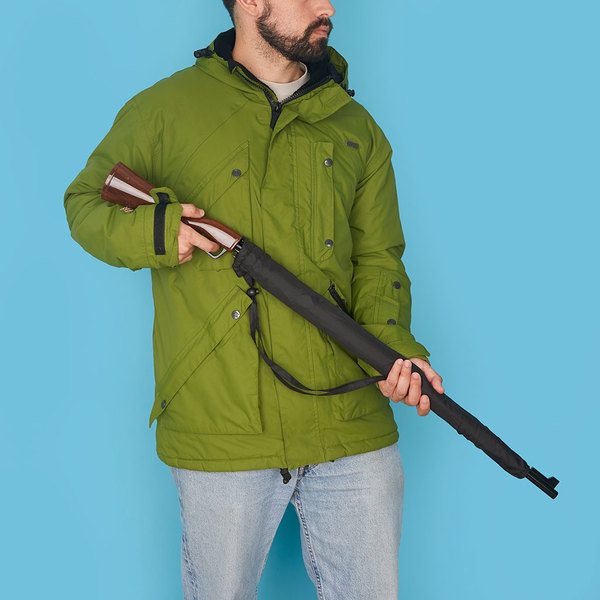 Con forma de rifle
