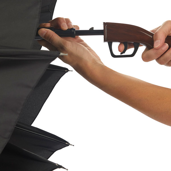 Con forma de rifle