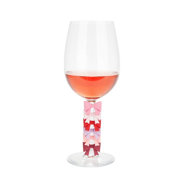 Balvi Marque-verres Coquette 6 marque-verres en forme de nœuds de différentes couleurs Plastique PVC